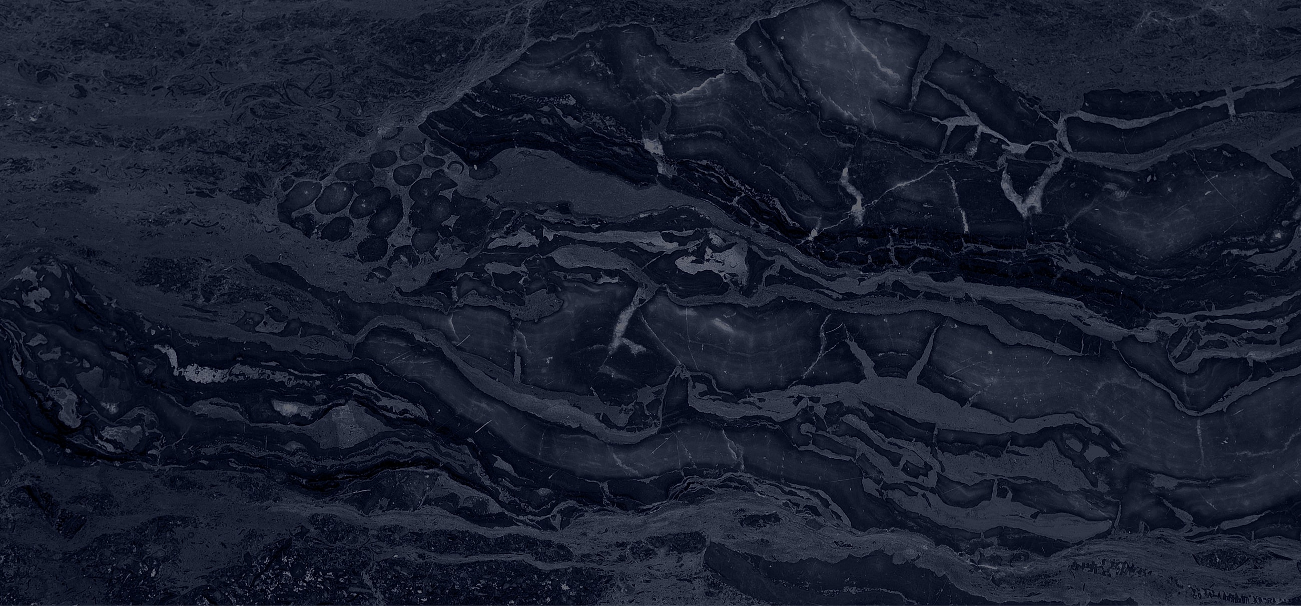 Dark, textured abstract marble background.